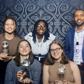 RPI students and mentor with awards won at conference