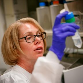 Deborah Baker performing Pulsed-field gel electrophoresis (PFGE) analysis on water samples received during the Legionella invest