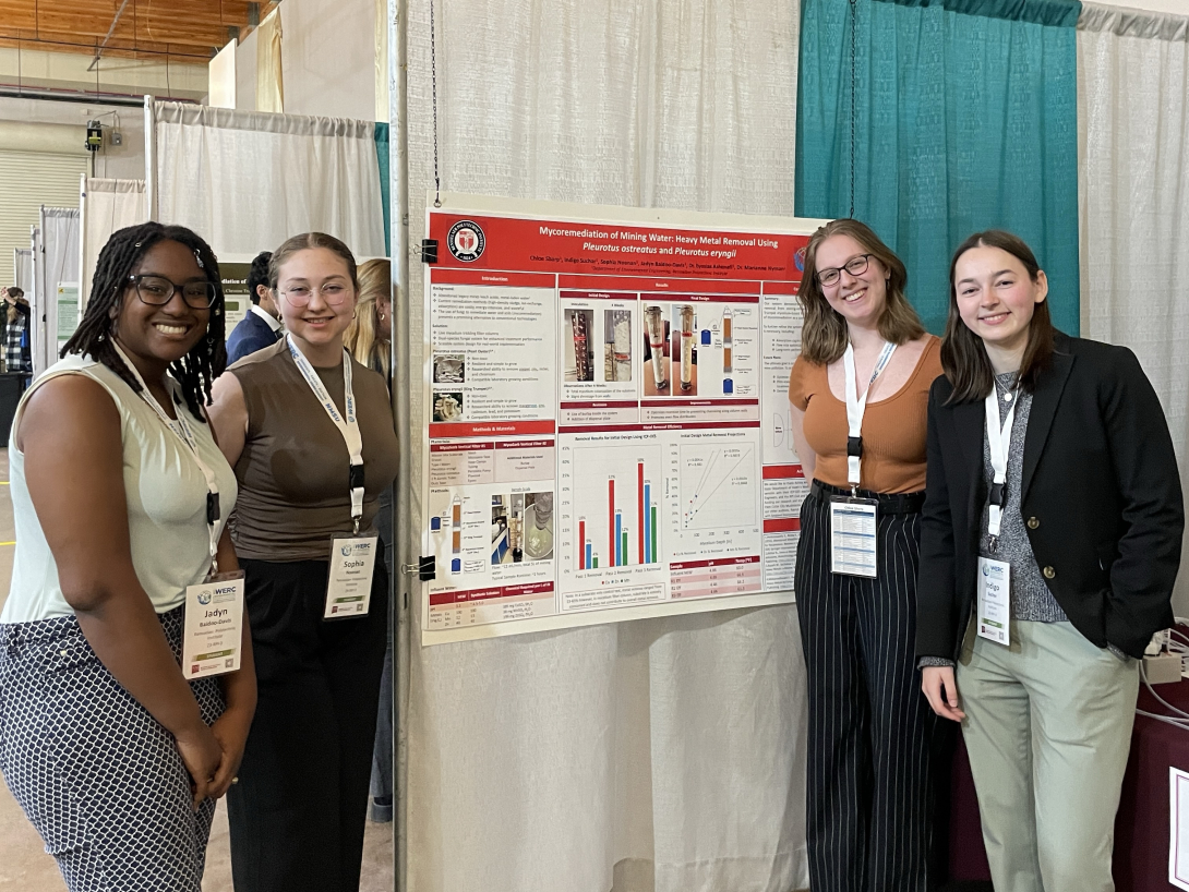 RPI students, Jadyn Baidoo-Davis, Sophia Noonan, Chloe Sharp, Indigo Suchar, at conference with their poster RPI students, Jadyn Baidoo-Davis, Sophia Noonan, Chloe Sharp, Indigo Suchar, at conference with their poster