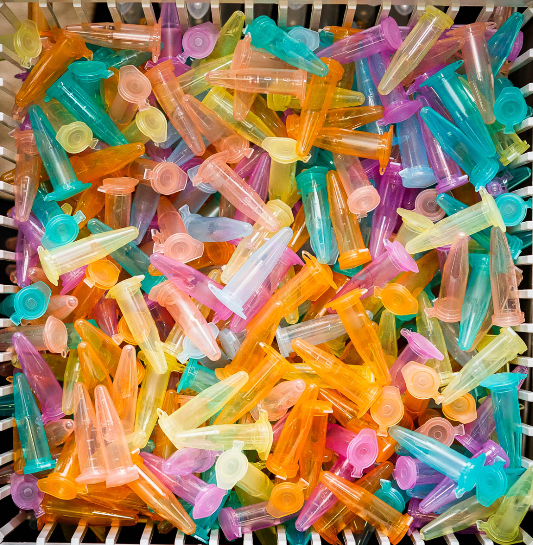 Tubes of various colors in a container